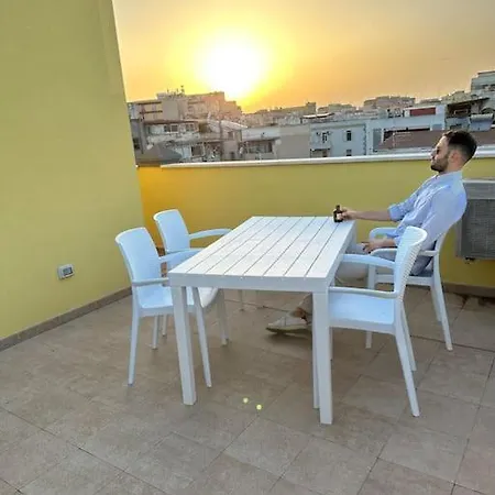 Attico Con Terrazza A Cagliari. Апартаменты *